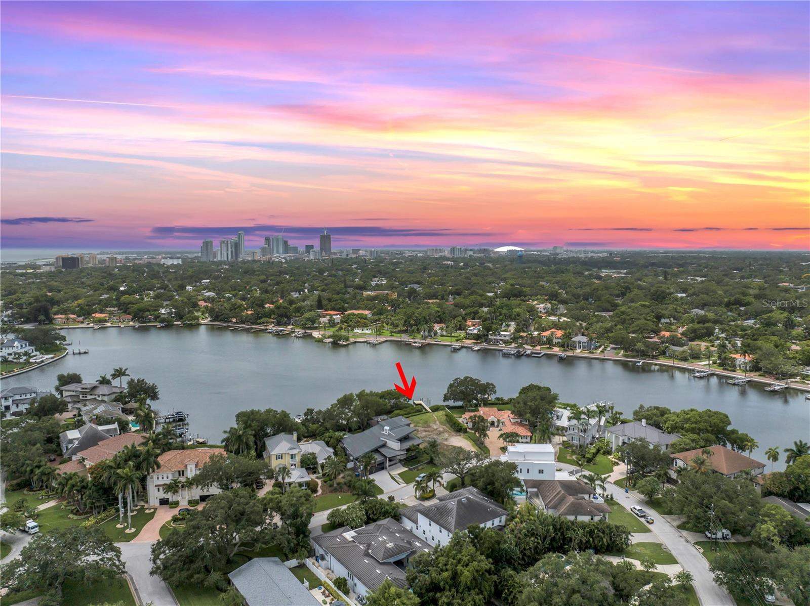 An opportunity to design and build your custom waterfront home in one of St. Petersburg’s most established neighborhoods. Located on Snell Isle, this 0.31-acre lot offers approximately 92 feet of direct waterfront along Coffee Pot Bayou. The no-wake zone is ideal for paddleboarding, kayaking, and boating, with regular sightings of dolphins and manatees. With a depth of 167 feet and a buildable footprint of 13,482 square feet, the lot offers the space and flexibility to create a true Florida waterfront estate.
Positioned along Monterey Boulevard, the property provides easy access to downtown St. Petersburg. Just minutes away by car, bike, or golf cart, you'll find waterfront parks, marinas, fine dining, galleries, and cultural venues. Whether you're planning a contemporary design or something more timeless, this lot offers a rare chance to build in a location that balances waterfront living with walkability and access to the best of the city.
Snell Isle is home to the Vinoy Golf Club, featuring golf, tennis, dining, and fitness amenities. The neighborhood is known for its mature trees, walkable layout, and proximity to the water.
Downtown St. Pete (#DTSP) includes iconic destinations such as the St. Pete Pier, Chihuly Collection, Museum of Fine Arts, The James Museum, and MAACM. With boutique shopping, open-air markets, rooftop dining, and a full calendar of cultural events, the area offers an engaging and dynamic lifestyle with lasting appeal.
For travelers, Albert Whitted Airport is less than a mile away and offers convenient private aviation access. St. Pete–Clearwater International Airport (PIE) and Tampa International Airport (TPA) are both within a 20-minute drive, making your next Jet2 Holiday or weekend escape easy to arrange.
The award-winning Gulf Coast beaches, including St. Pete Beach and the iconic Don CeSar Hotel, are just 15 minutes away. Enjoy a morning on the sand, a sunset dinner at the Don, or a boat day with direct access to Tampa Bay and the Gulf of Mexico from your backyard.
This is one of the few remaining vacant waterfront parcels on Coffee Pot Bayou, surrounded by custom estate homes in a well-established community.
If you’re looking for a waterfront property that combines location, lifestyle, and long-term potential, this Snell Isle homesite offers an unmatched opportunity.