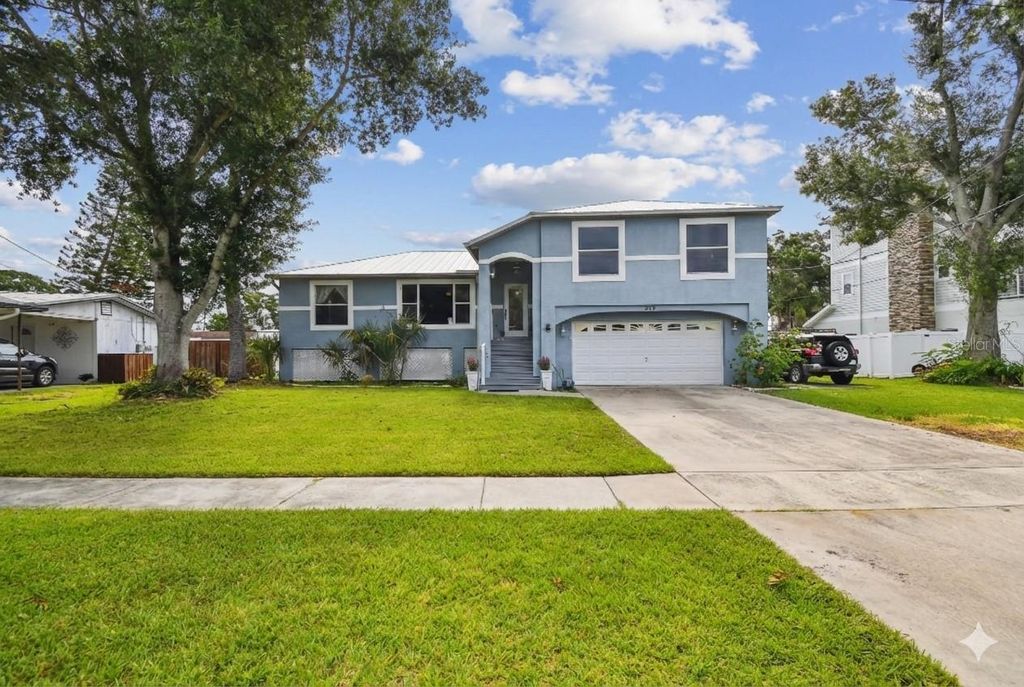 Photo of 317 Shore Drive E, Oldsmar, FL 34677 (MLS # FC315737)