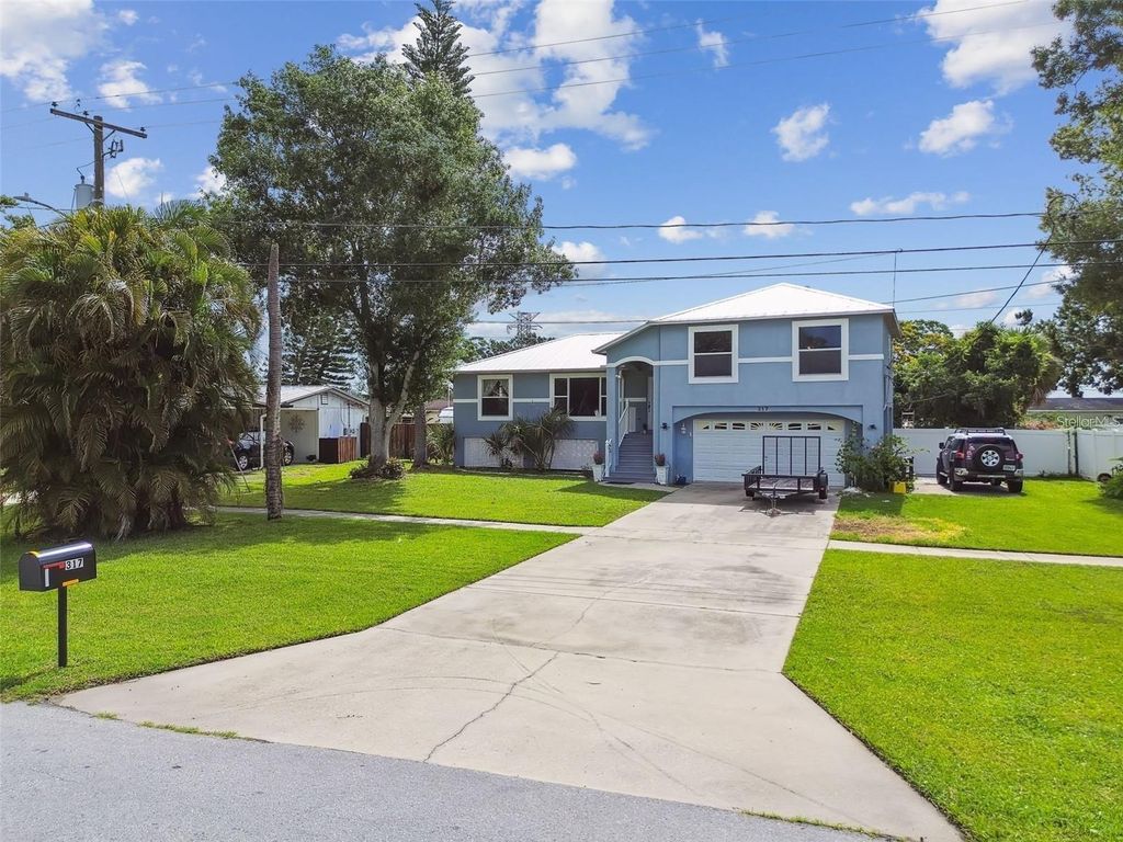 Photo of 317 Shore Drive E, Oldsmar, FL 34677 (MLS # FC315737)