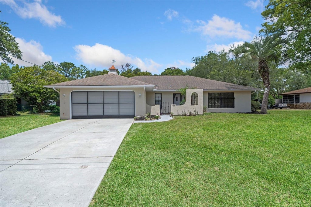 Photo of 1479 Autumn Road, Spring Hill, FL 34608 (MLS # TB8520624)