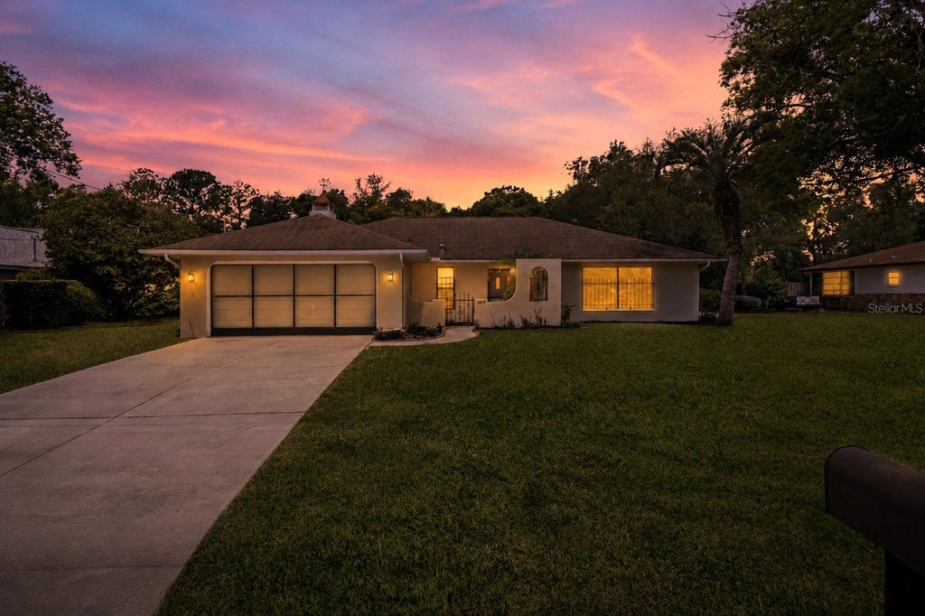 Photo of 1479 Autumn Road, Spring Hill, FL 34608 (MLS # TB8520624)