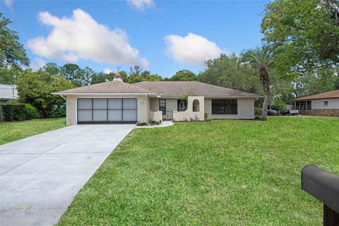 Photo of 1479 Autumn Road, Spring Hill, FL 34608 (MLS # TB8520624)