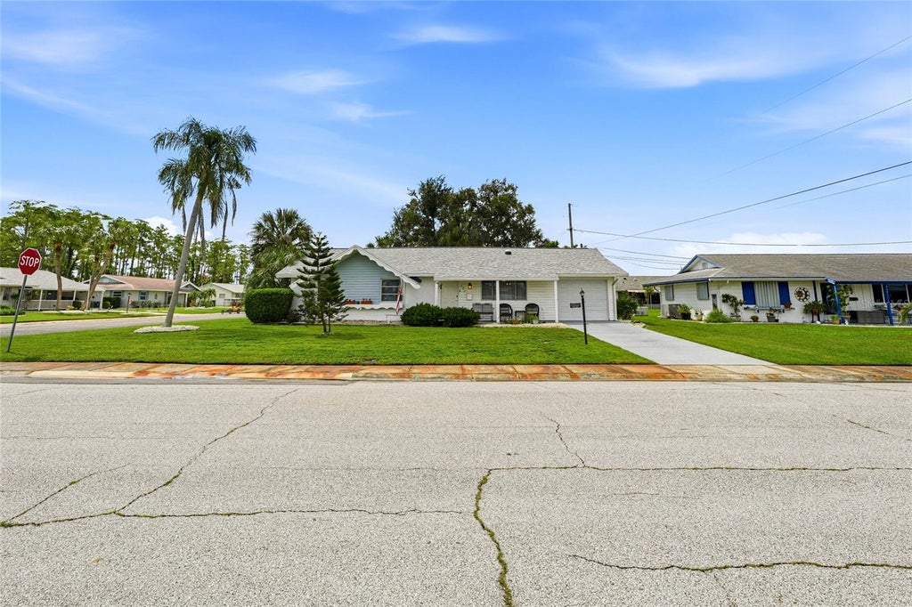 Photo of 702 Thunderbird Avenue, Sun City Center, FL 33573 (MLS # TB8545978)