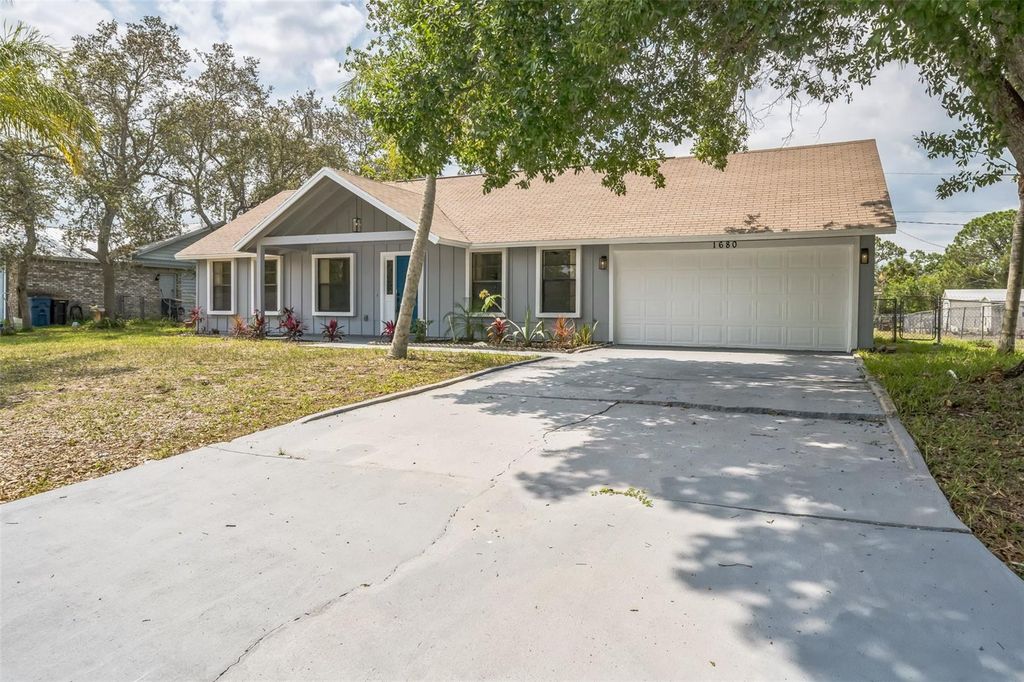 Photo of 1680 Travis Street SE, Palm Bay, FL 32909 (MLS # A4680327)