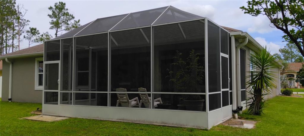 Photo of 45 Zonal Geranium Trail, Palm Coast, FL 32164 (MLS # FC318758)