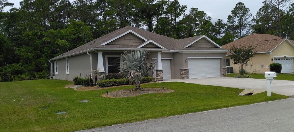 Photo of 45 Zonal Geranium Trail, Palm Coast, FL 32164 (MLS # FC318758)