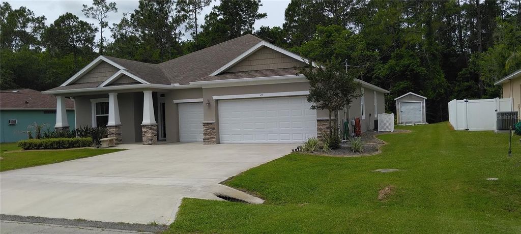Photo of 45 Zonal Geranium Trail, Palm Coast, FL 32164 (MLS # FC318758)