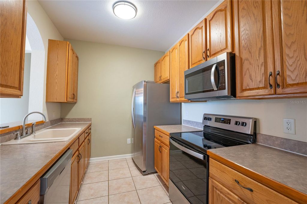 Photo of 13536 Turtle Marsh Loop #523, Orlando, FL 32837 (MLS # O6388825)