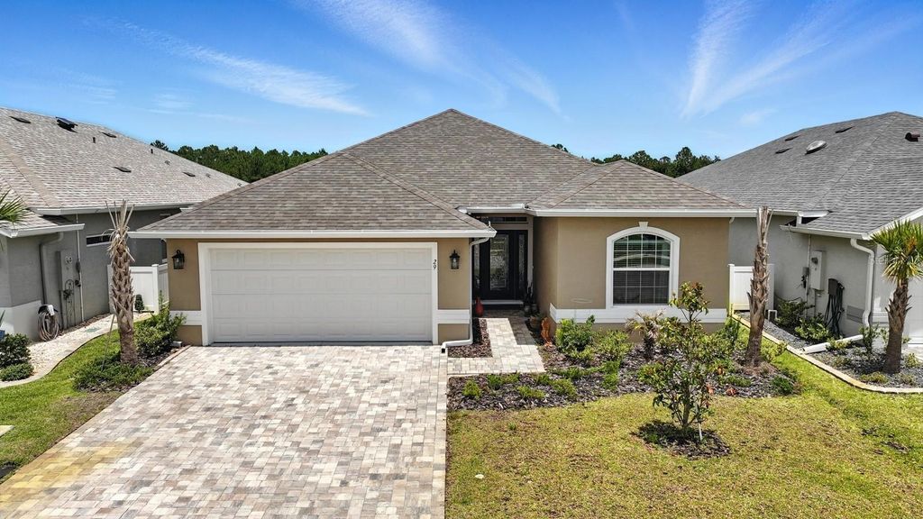Photo of 29 Lagoon Way, Palm Coast, FL 32137 (MLS # FC310948)