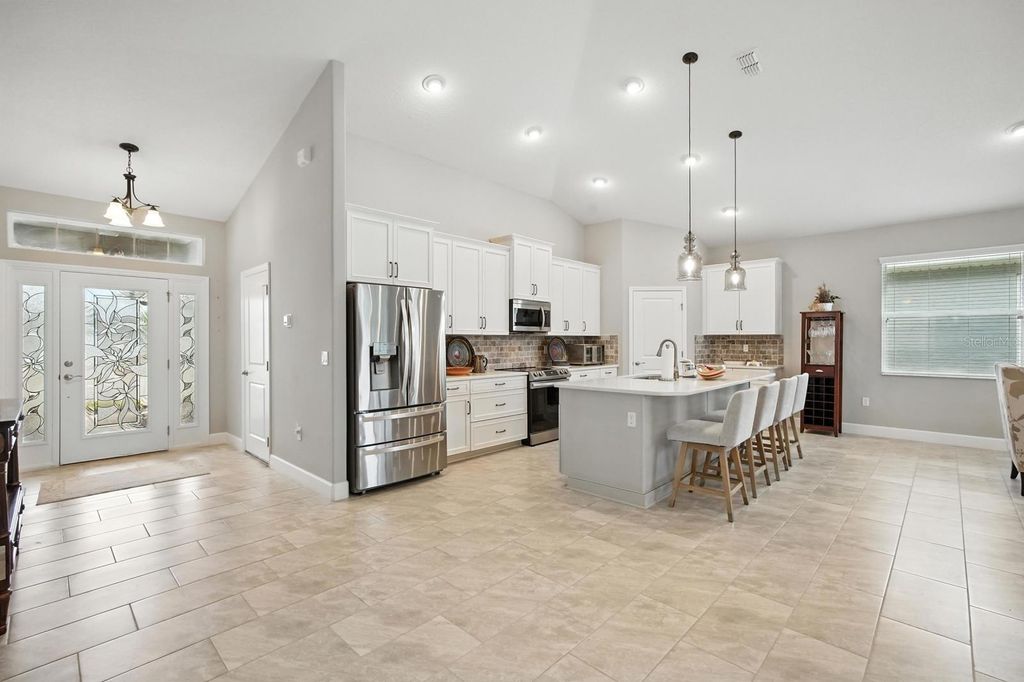 Photo of 29 Lagoon Way, Palm Coast, FL 32137 (MLS # FC310948)