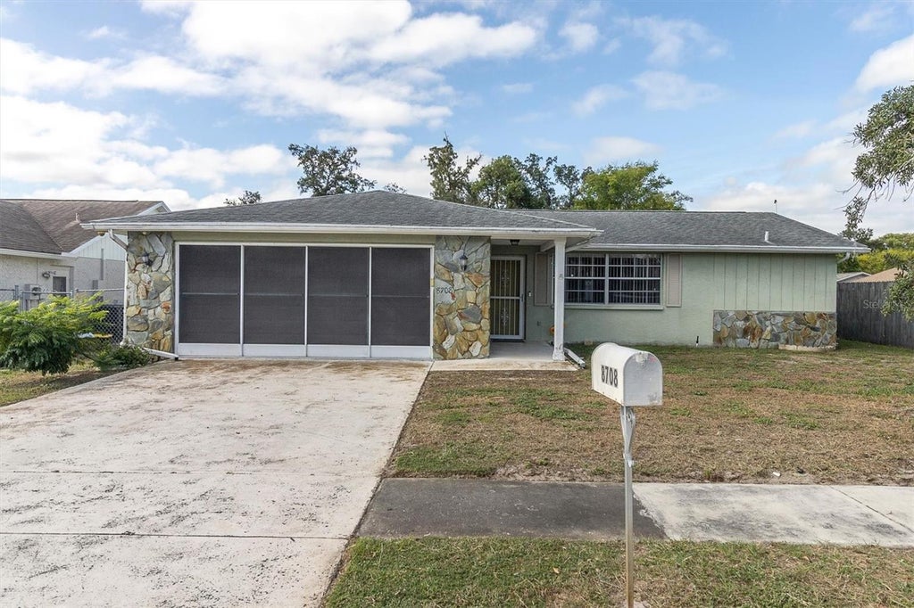 Photo of 8708 Briar Patch Drive, Port Richey, FL 34668 (MLS # TB8550894)
