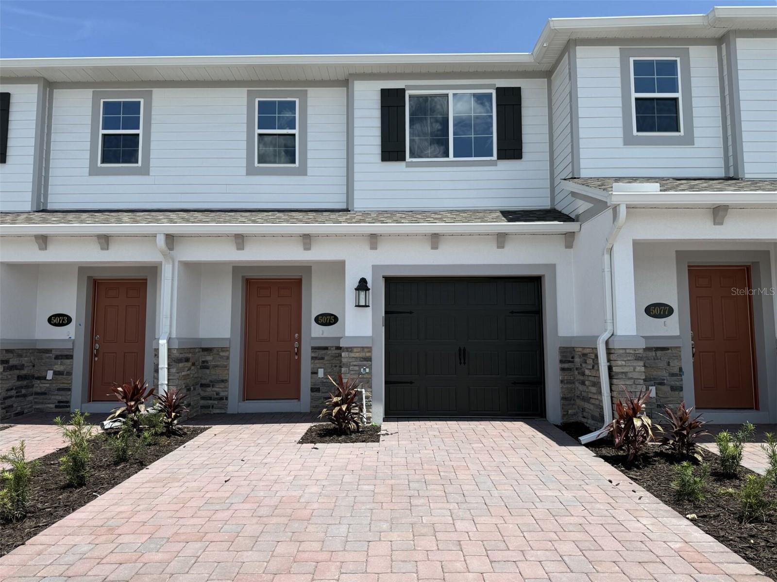 Discover this stunning new construction townhome at 5075 Prairie Preserve Run in St. Cloud. Built by M/I Homes, this thoughtfully designed 2-story residence offers 1,379 square feet of comfortable and functional living space.
Inside, you’ll find three spacious bedrooms, two full bathrooms, and a convenient powder room. The open-concept layout seamlessly connects the main living areas, creating an ideal space for both everyday living and entertaining. With quality craftsmanship throughout, every detail has been carefully considered to maximize comfort and style.
Upstairs, the owner’s bedroom offers a quiet retreat, located just off the loft for added privacy. The additional bedrooms provide flexibility for family, guests, or even a home office. A one-car garage adds convenience, while the home’s efficient design ensures every square foot is put to good use.
The community’s location provides easy access to nearby parks and recreational opportunities, offering plenty of ways to enjoy the outdoors. With brand-new construction and M/I Homes’ reputation for excellence, this townhome is move-in ready and designed for modern living.
Experience the benefits of a thoughtfully planned home that combines practical design, contemporary features, and reliable construction in a desirable St. Cloud neighborhood.
