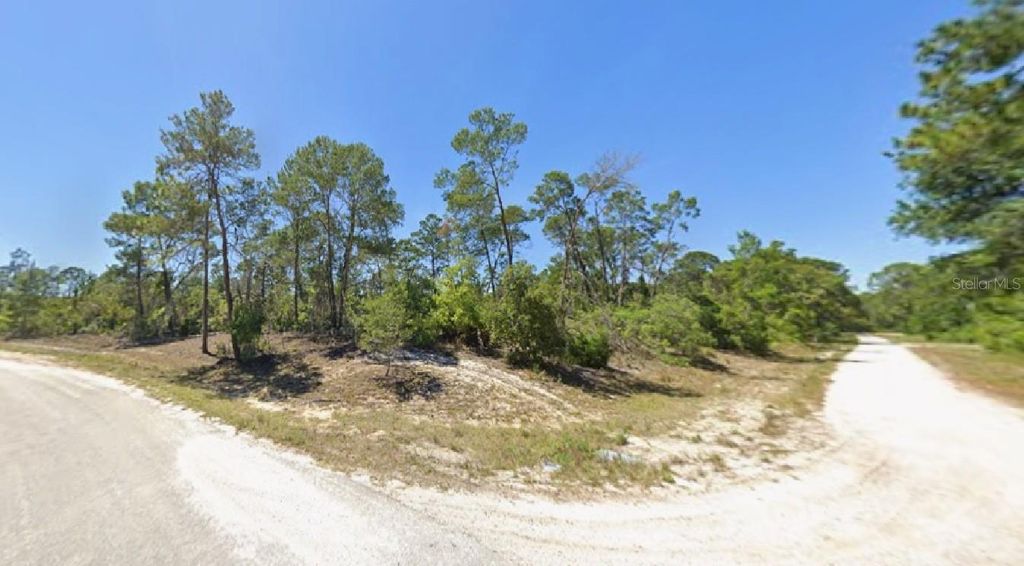 Photo of 512 House Sparrow Drive, Lake Placid, FL 33852 (MLS # R4910261)