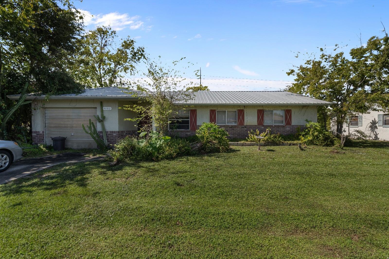 This 3-bedroom, 2-bathroom home in Titusville presents a strong value-add opportunity. The interior is ready for renovation, offering a blank canvas for customization. It features a spacious kitchen, generously sized rooms, and a screened-in patio overlooking a large backyard—providing ample space for outdoor enjoyment or future upgrades. Conveniently located near shopping, schools, and major roadways, this property is ideal for buyers looking to invest or personalize their next home.