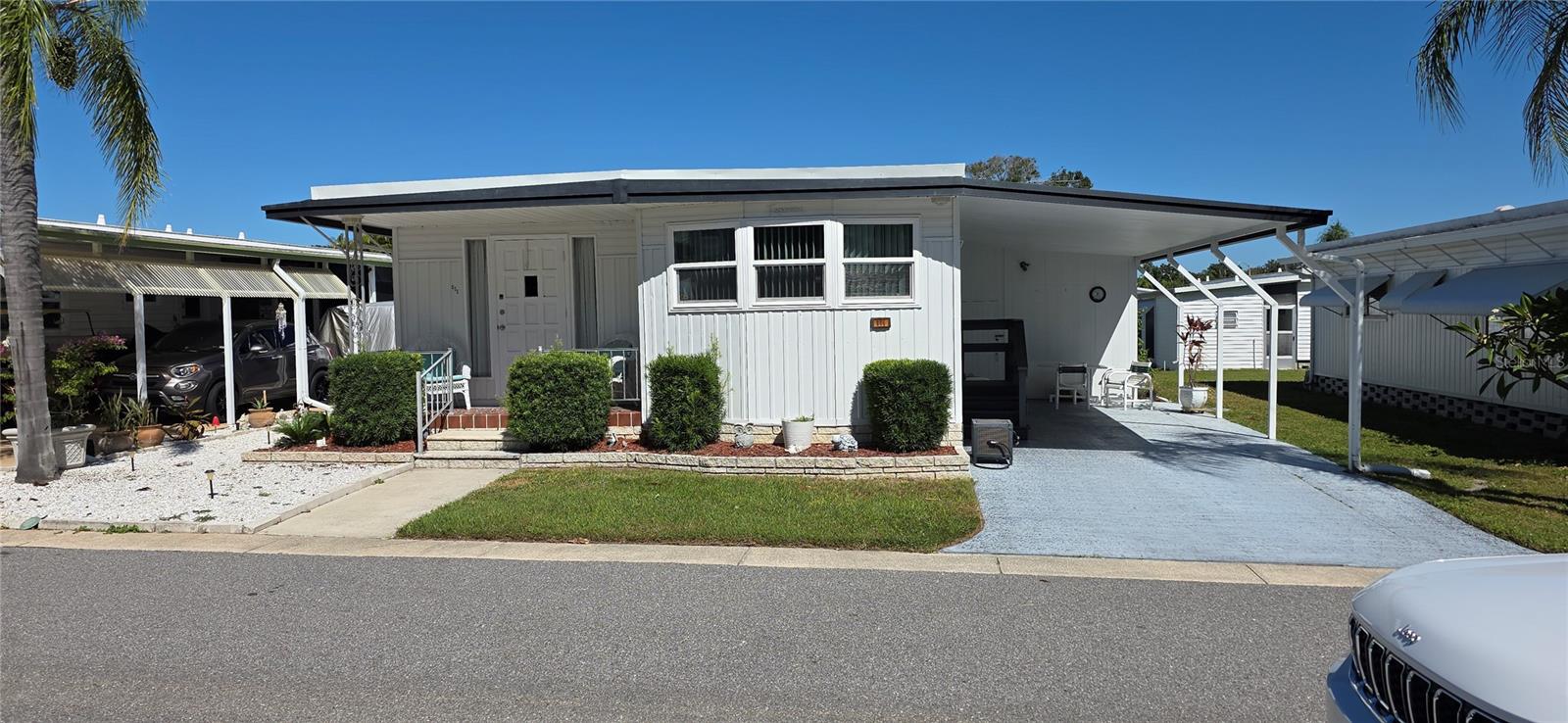 Quiet and secluded this two bedroom two bath home is located in one of Pinellas County's best kept secrets. This home is move-in ready and has a double roof and is immaculate! Country Park is a 55 and over community for active adults. Park amenities include an air conditioned club house with WiFi, heated swimming pool, laundry facilities and shuffleboard courts. Plan a visit to Country Park if you are looking for a quiet affordable Florida lifestyle. A low monthly maintenance fee of only $260 includes lawn, trash, water and sewer. Located in beautiful Country Park, one of Pinellas County's premier 55 and over communities, where you are a property owner, not a renter. Country Park is conveniently located just minutes from world famous Clearwater Beach, several high end shopping malls, restaurants, major hospitals and two international airports. The asking price of the home includes the land share value. No pets allowed.