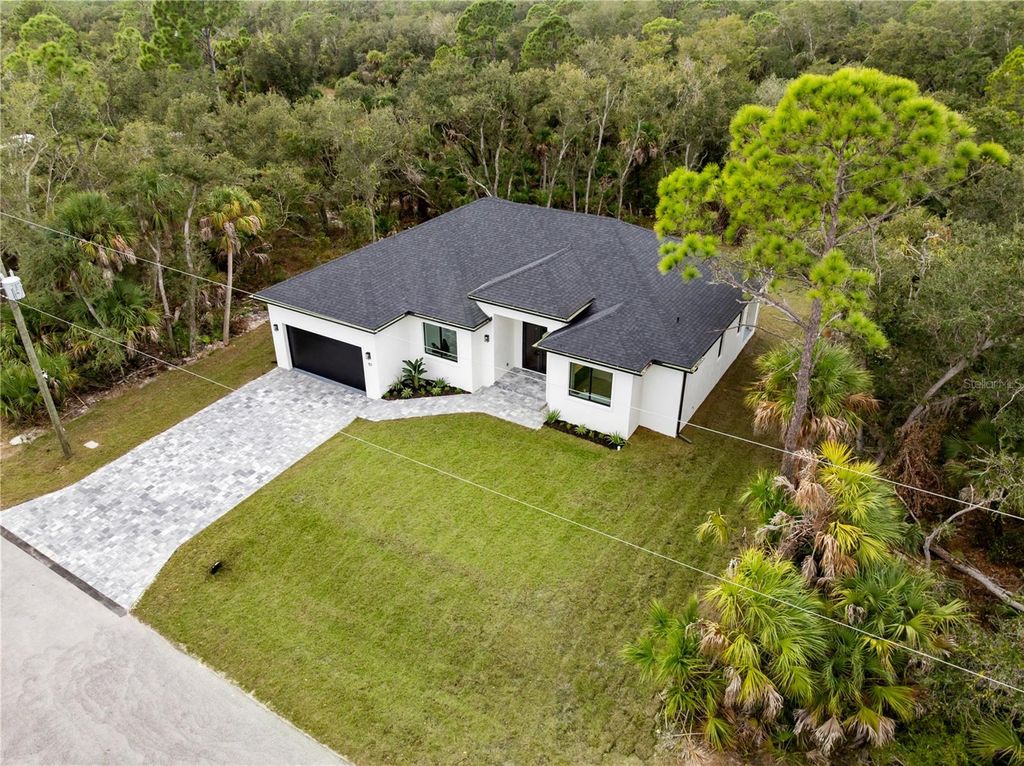 Photo of 157 Heather Street, Port Charlotte, FL 33953 (MLS # A4673792)