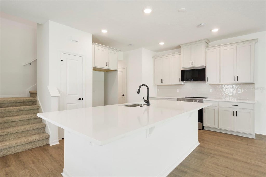 Photo of 1633 Greenleaf Woods Cove, Oviedo, FL 32765 (MLS # O6433024)