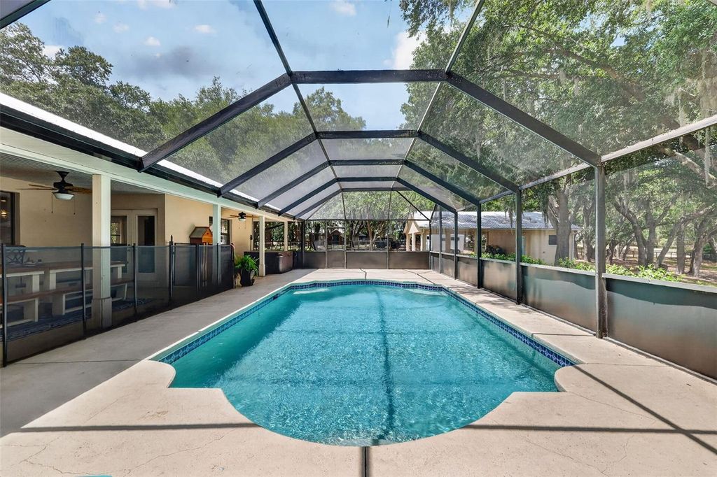 Photo of 11241 Em En El Grove Road, Leesburg, FL 34788 (MLS # G5111421)