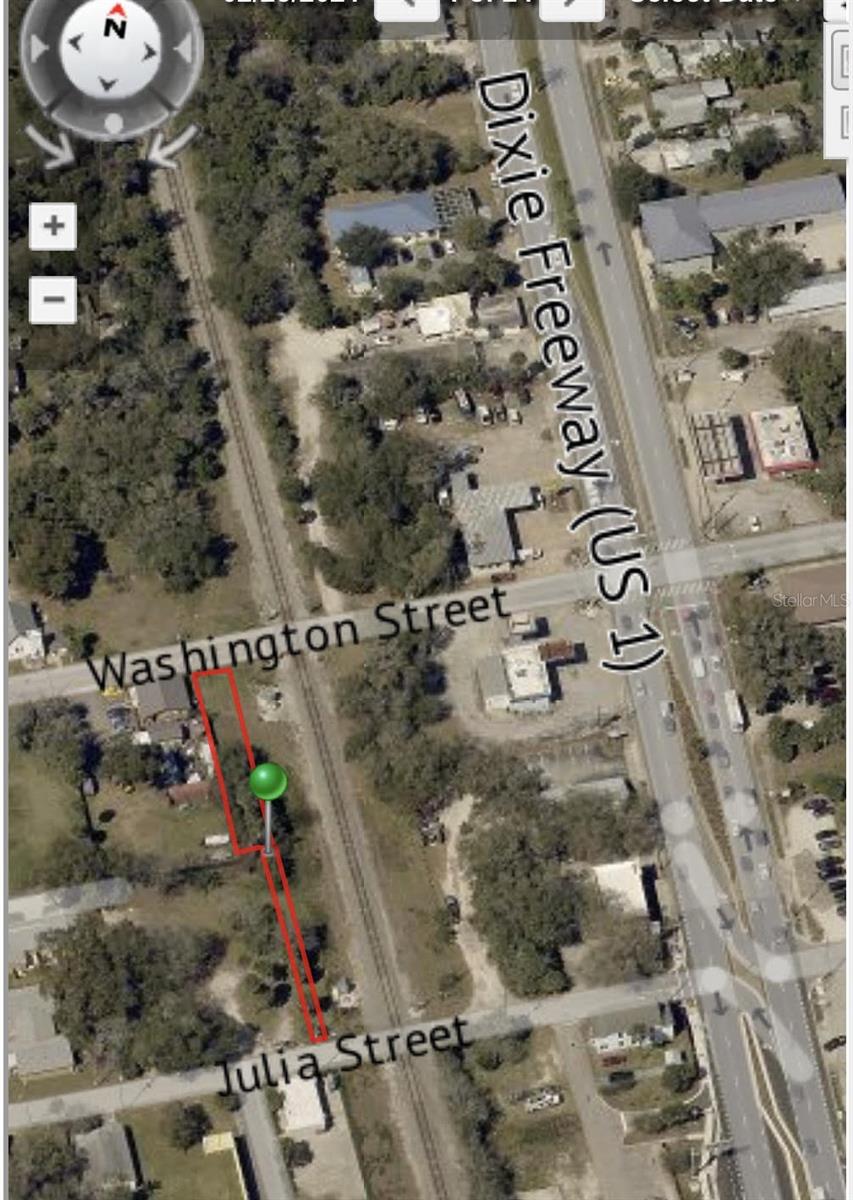 Long and narrow parcel of land ideal for warehouse units. Located west of US HWY 1 and just west of railroad tracks between Washington St. and Julia St.