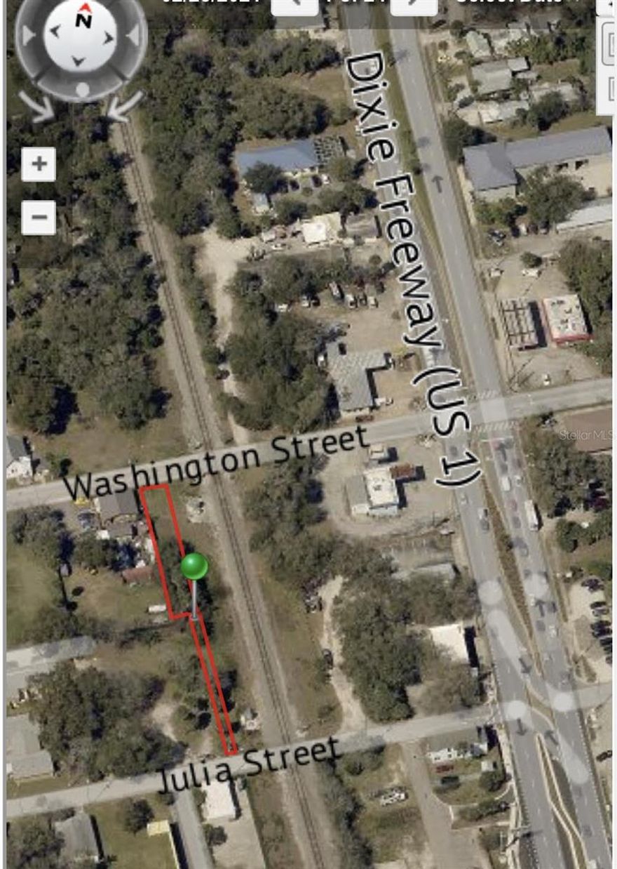 Long and narrow parcel of land ideal for warehouse units.  Located west of US HWY 1 and just west of railroad tracks between Washington St. and Julia St.