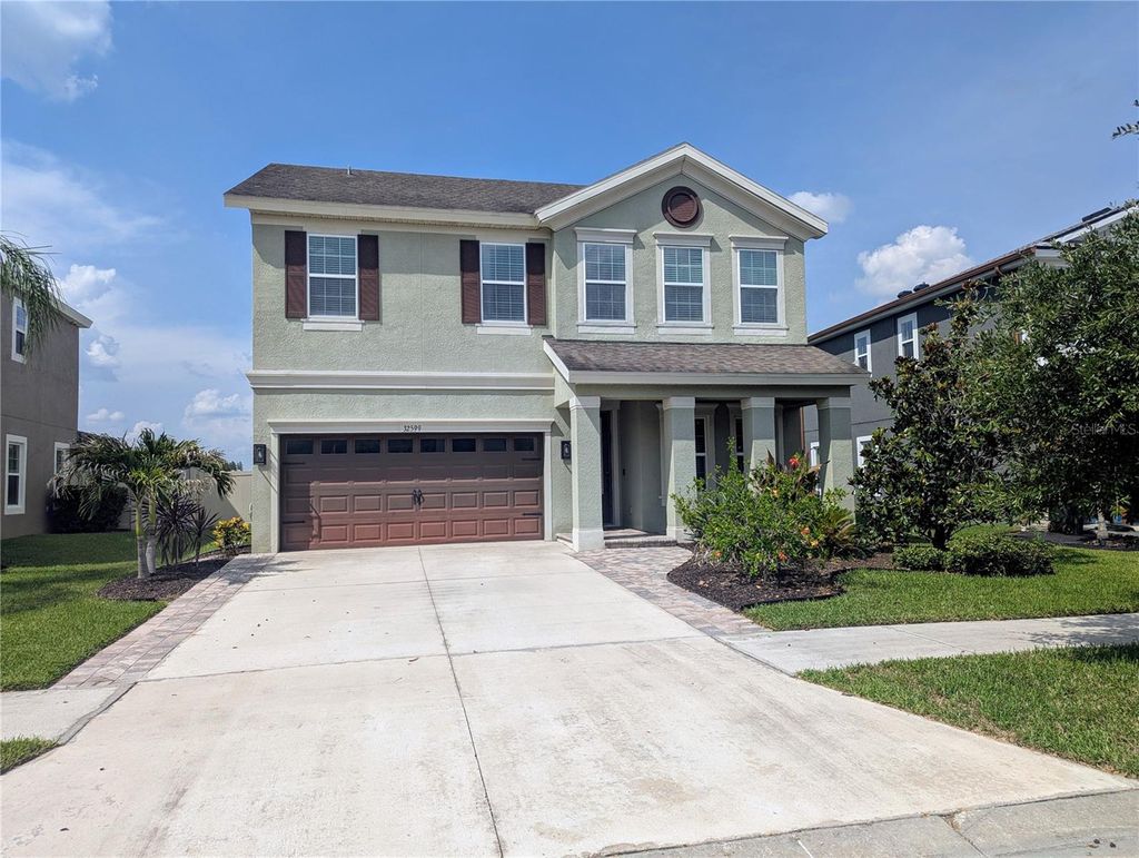 Photo of 32599 Natural Bridge Road, Wesley Chapel, FL 33543 (MLS # TB8396178)