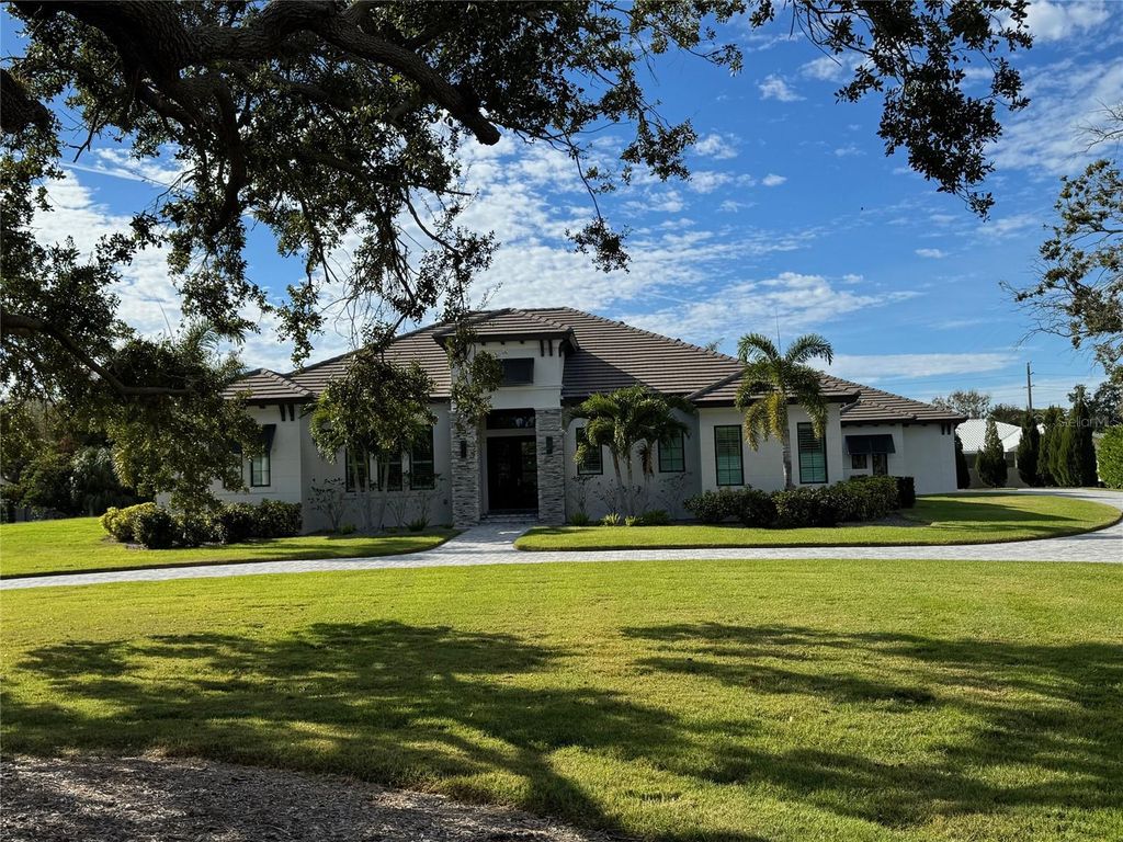 Photo of 3605 Beneva Oaks Circle, Sarasota, FL 34238 (MLS # A4676766)