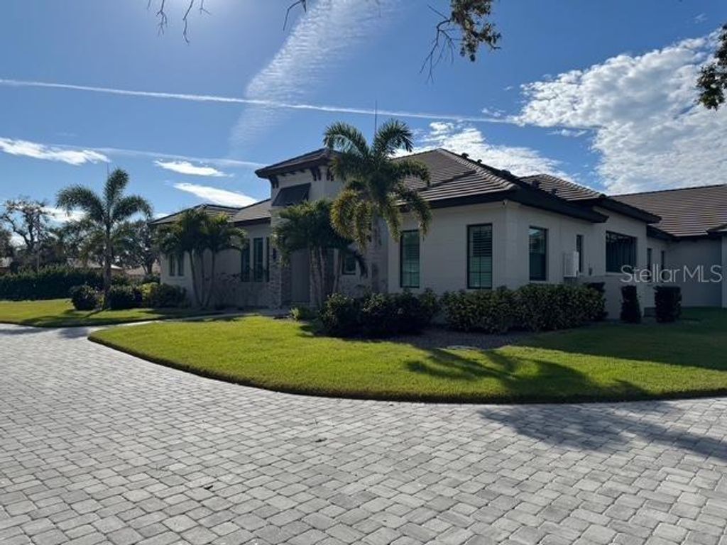 Photo of 3605 Beneva Oaks Circle, Sarasota, FL 34238 (MLS # A4676766)