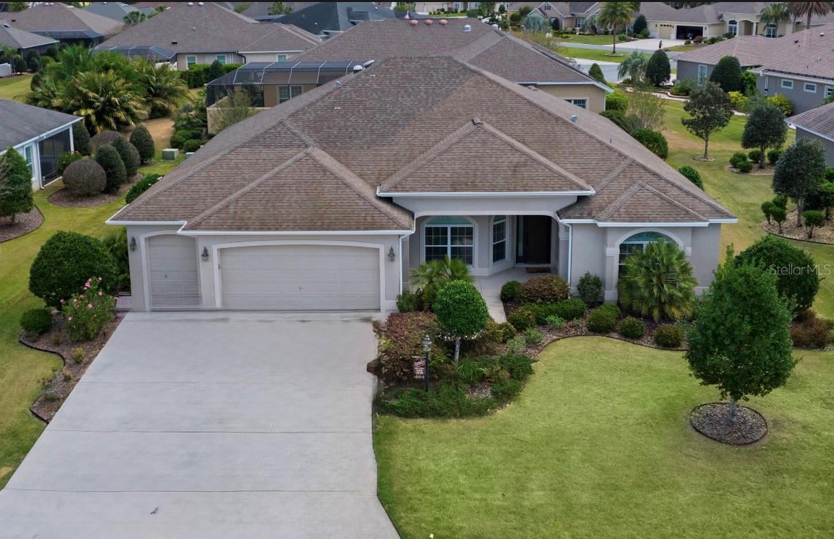 One or more photo(s) has been virtually staged. Price just reduced! If you're in search of an exceptional home, look no further—this is it! This expanded custom Natchez Premier home features 3 bedrooms, 2 bathrooms, and a versatile flex room, all situated in the highly desirable Village of Pinellas. Designed for both style and comfort, this open-concept home boasts 10-foot ceilings, as well as tray ceilings in the living area and master bedroom, adding a touch of elegance.
The open kitchen is thoughtfully designed for both functionality and entertaining, featuring a cozy eat-in nook, a generous island, a breakfast bar with ample seating, and an abundance of counter space and cabinet storage.
The spacious master suite includes a bonus room that can be used as a private sitting area, home office, or craft room. With its own dual closets, this flexible space offers endless possibilities to fit your needs. The master has two walk-in closets and a luxurious en-suite bathroom featuring dual vanities and a walk-in shower for a spa-like experience.
Enjoy year-round Florida living in the enclosed lanai, perfect for relaxation or entertaining.
With a 2-car garage and an additional golf cart garage, there's plenty of room for both vehicles and extra storage. The home also features an added workshop off the garage—ideal for hobbies, storage, DIY projects, or craft enthusiasts. HVAC 2023, Electric Water Heater 2024. Located just minutes from Brownwood Paddock Square and Trailwinds Shopping Plaza, this home offers a perfect blend of privacy and convenience, with easy access to shopping, dining, and entertainment. Move-in ready with fresh, neutral paint throughout.
Don't miss out on the chance to make this stunning home yours!