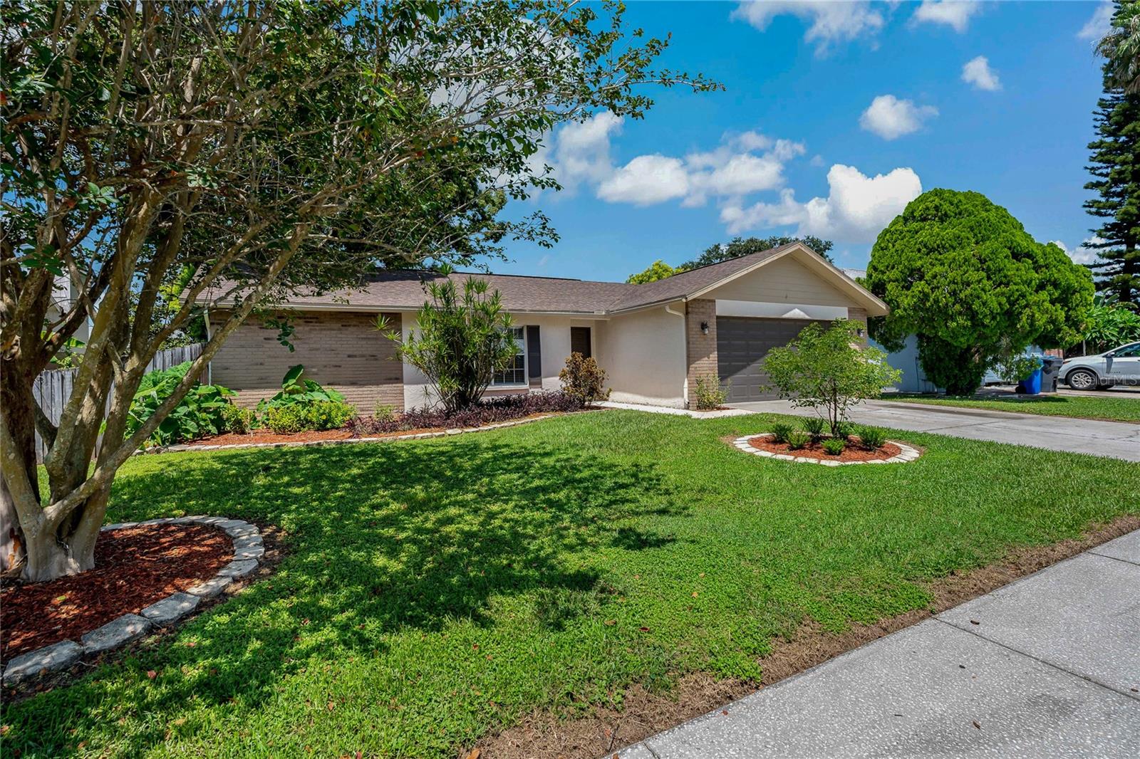 3BR/2BA Home with plenty of charm. As you pull up you will fall in love with the mature landscaping with a nice size yard. This home is very welcoming This homes kitchen has white cabinets, a stainless steel sink, refrigerator, dishwasher, range and microwave. There's a nice sized living/dining room combination and separate family room. There's a split bedroom design and all bedrooms are nicely proportioned. The master bedroom has a spacious walk-in closet and master bath. There is also a full guest bath located between the two additional bedrooms. You'll love the charming real wood floors. When you think it can't get any better, step out back into the comfort of you screened-in and covered patio. The backyard is surrounded by fencing and a beautiful majestic oak tree. Hurry! This one won't last long!