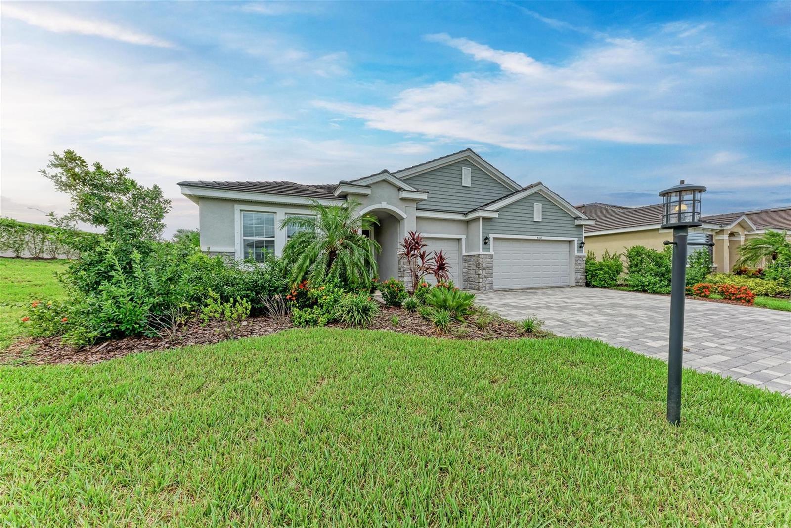 Stunning 4BR/3.5BA + Bonus Room in Gated Star Farms – Resort-Style Amenities
This beautifully appointed single-story home in the sought-after gated community of Star Farms offers a perfect blend of style, comfort, and functionality. The thoughtful split floor plan features 4 bedrooms, 3.5 baths, a versatile bonus room, and a spacious 3-car garage.
Step inside to find two bedrooms sharing a Jack-and-Jill bath, a third bedroom with a private bath, and a bonus room ideal for a second living space, office, or in-law suite. The open-concept great room flows seamlessly into a gourmet kitchen boasting quartz countertops, stainless steel appliances, sleek grey cabinetry, and an eat-in dining area with backyard and screened lanai views.
The private primary suite offers a spa-like bath with a walk-in shower, garden tub, dual sinks, and a generous walk-in closet. High ceilings (9’4”), elegant tile flooring, and abundant natural light enhance the home’s inviting feel.
Star Farms spans 700 acres and will feature resort-style amenities including pools, clubhouse, fitness center, tennis & pickleball courts, dog parks, splash pad, bocce ball, cornhole, outdoor cabanas, and walking trails.