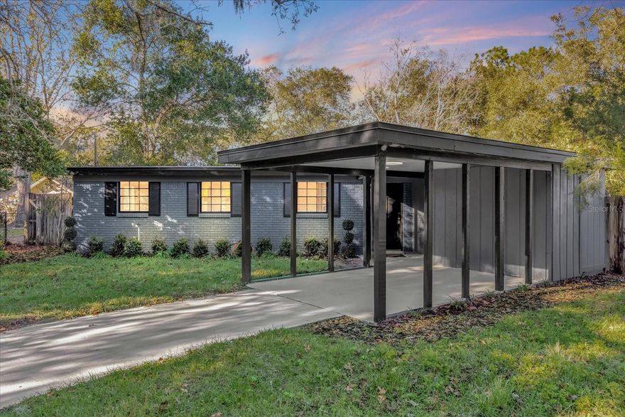 Lightning-fast response—see today and move in within 30 days. This beautifully custom-renovated 3-bedroom, 2-bath home at 409 Oakhurst Street is designed for buyers who want style, comfort, and location working together. From the moment you arrive, the home feels intentional—warm, refined, and easy to live in. Inside, a cozy living room with a custom arched reading nook invites you to slow down and stay awhile, while the designer kitchen and dining space delivers the kind of everyday luxury buyers crave, featuring a cooktop island, skylight, built-in desk area, and elegant white-and-gold finishes that make the space feel bright, open, and elevated. The spacious family room anchors the home with a dramatic real rock focal wall and custom built-in shelving in deep blue and stained wood, creating a setting that feels both impressive and comfortable. The primary bathroom is a true retreat, finished with wood-look tile, gold fixtures, and a high-end hands-free smart toilet, while the guest bath offers crisp deep-blue and white finishes. A black marble tile mudroom with custom wood storage adds practical luxury to daily life. Major updates include a brand-new 2025 roof and fresh sod for strong curb appeal. Beyond the home itself, the location seals the deal—just minutes from Altamonte Mall for shopping and dining, Uptown Altamonte with its vibrant community events, restaurants, and waterfront paths, and the brand-new Rolling Hills Park development offering modern green space and recreation. This isn’t just a home—it’s a lifestyle upgrade in one of Altamonte Springs’ most connected and evolving areas, ready for you to step in and start living.