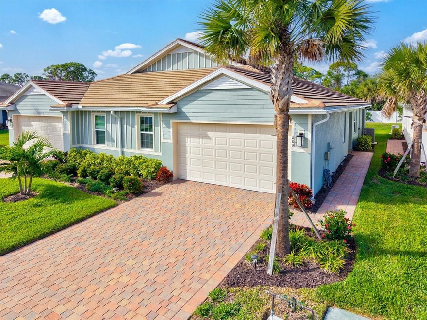A must-see villa in the desirable Palencia community of Venice, FL! Built in 2023, this beautifully upgraded 2-bedroom, 2-bath home with a den and screened lanai is positioned on a staggered lot, offering added privacy. All furnishings are negotiable, creating an ideal move-in-ready or turnkey opportunity.
This home features 9-foot ceilings and 8-foot doors with lever handles throughout, impact-resistant windows and sliding glass door, cordless window treatments, comfort-height toilets, and stained and sealed floor grout. The bright chef’s kitchen is a standout, featuring under-cabinet lighting with dimmers, a tiled backsplash, soft-close cabinets and drawers with pull-out shelving—including trash and recycling bins—quartz countertops, stainless steel appliances, an oven with air-fryer capability, a three-tier dishwasher, and two spacious pantries.
The owner has added numerous upgrades, including five energy-efficient ceiling fans, a dining room light fixture, a whole-house gutter system, a salt-free water purification system, a Reme Halo LED air purification system with UV blue light, a Drain Guard on the HVAC system, a whole-home surge protector, keyless entry, smart-home features with ADT security services available, and additional recessed lighting.
Custom California Closets provide exceptional organization in the primary walk-in closet, laundry room, and garage.
Palencia offers a resort-style lifestyle with a beautiful community pool, clubhouse, bocce ball courts, and two scenic lakes with fountains. Low HOA fees—with no CDD fee—include lawn care, mulching, exterior painting of the villas, and roof replacement, providing truly low-maintenance living.
Ideally located for beachgoers and golfers alike, this home offers a quick commute to several top area beaches and golf courses, along with plentiful dining and shopping options nearby. Just minutes from Venice Island and surrounding beaches, it is ready for you to enjoy the very best of the Florida lifestyle.