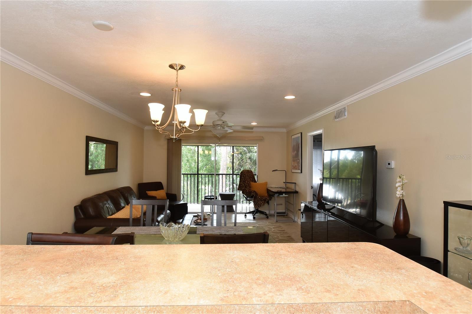 ***AVAILABLE December 2025 through April 2026*** (3 month minimum) WEST OF TAMIAMI TRAIL! Less than 1 mile from North Bridge entrance to Siesta Key. 3-story unit with the elevator in the center of courtyard. Two-bedroom condo with beautiful kitchen. Second bedroom used as an office and has a pull-out bed. Living room has pull out couch. Washer/dryer in bathroom and the condo has a laundry area for your use. Nice screened area. Covered parking spot #59