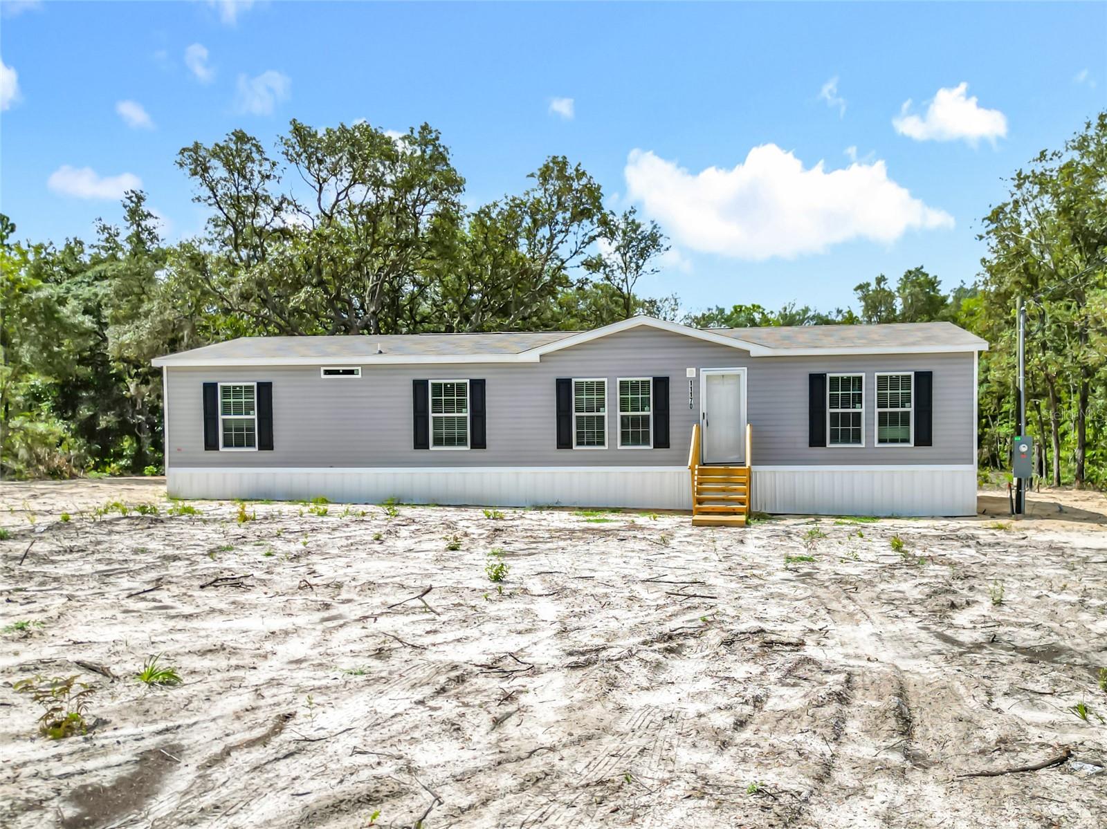 Discover the perfect blend of comfort, style, and convenience in this brand-new 4-bedroom, 2-bath Scotbilt home, ideally located in a peaceful and private community just 30 minutes from both Ocala and Gainesville.Step inside to find a spacious open-concept floor plan designed for modern living — perfect for entertaining guests or relaxing with family. The kitchen is a true showstopper, featuring sleek stainless steel appliances, a stylish center island, and plenty of storage space to meet all your culinary needs.Enjoy the fresh, clean look of fully drywalled interiors with neutral finishes that are ready for your personal touch. Whether you’re a first-time homebuyer, looking to downsize, or seeking a smart investment opportunity, this home delivers exceptional value in a growing area.
Schedule your private showing today and make this beautiful home yours!