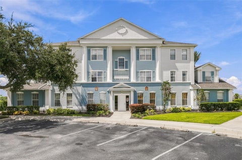 Photo of 7603 Heritage Crossing Way #202, Reunion, FL 34747 (MLS # O6443576)