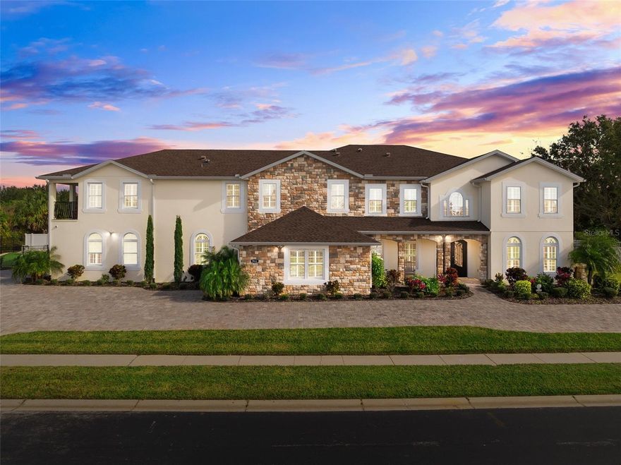 It is a rare opportunity when you can blend luxury and investment. This property offers just that. This home was crafted to cater to the needs of the most discerning of guests. The home has successfully operated as a short-term rental for many years; however, in 2022, the sellers made the decision to raise the bar even higher, redesigning the home to offer everything a guest needs or wants without ever leaving the estate. The success of this decision is evidenced by the home’s 2024 calendar reflecting over 250 days booked. 
 
From the moment you approach, it is apparent that every attention was paid to the finest of detail. The vast, circular driveway offers ample parking for both guests and visitors. This feature alone is something difficult to find in competing short-term rental investments of this size. The overall expanse of this property is made possible by the graciously appointed 0.49 acre homesite; another offering difficult to find within this highly sought-after location which places you within mere minutes of the Walt Disney World Resort and so much more! The prime location is accentuated by the neighborhood itself. The mature development offers a gated entry, mature foliage and lakes. It is as scenic as it is convenient! 

As you enter through the stately wrought iron double doors, you will be overwhelmed by the home’s grandeur. The finishes throughout the home were chosen to present a cohesive and elevated design. Elements such as the chiseled travertine and solid oak flooring, soaring cathedral ceilings, Wolfe Appliances, and Sub-Zero refrigeration are indicative of the sellers’ demand for the quality to be evident in every detail of this property. 

The demand for quality began with the construction phase of this expansion and continues to this day. Great importance was placed on efficiency and reliability, with sizable investments being made in items such as insulation, block construction, and Rinnai natural gas water heaters. From the placement of each block to each piece of china, the same care has been evident throughout. 

Playful components were also added during the process of reimagining the estate. Custom murals, a dedicated indoor play area, a music room, and a miniature golf course are amongst the upgrades made to ensure your next investment triumphs over competitors and market trends.
 This estate and its offerings are endless. We invite you to experience all that is 7931 Sea Pearl Circle for yourself as there truly are not enough words to describe its opulence. Welcome to your next turn-key investment.