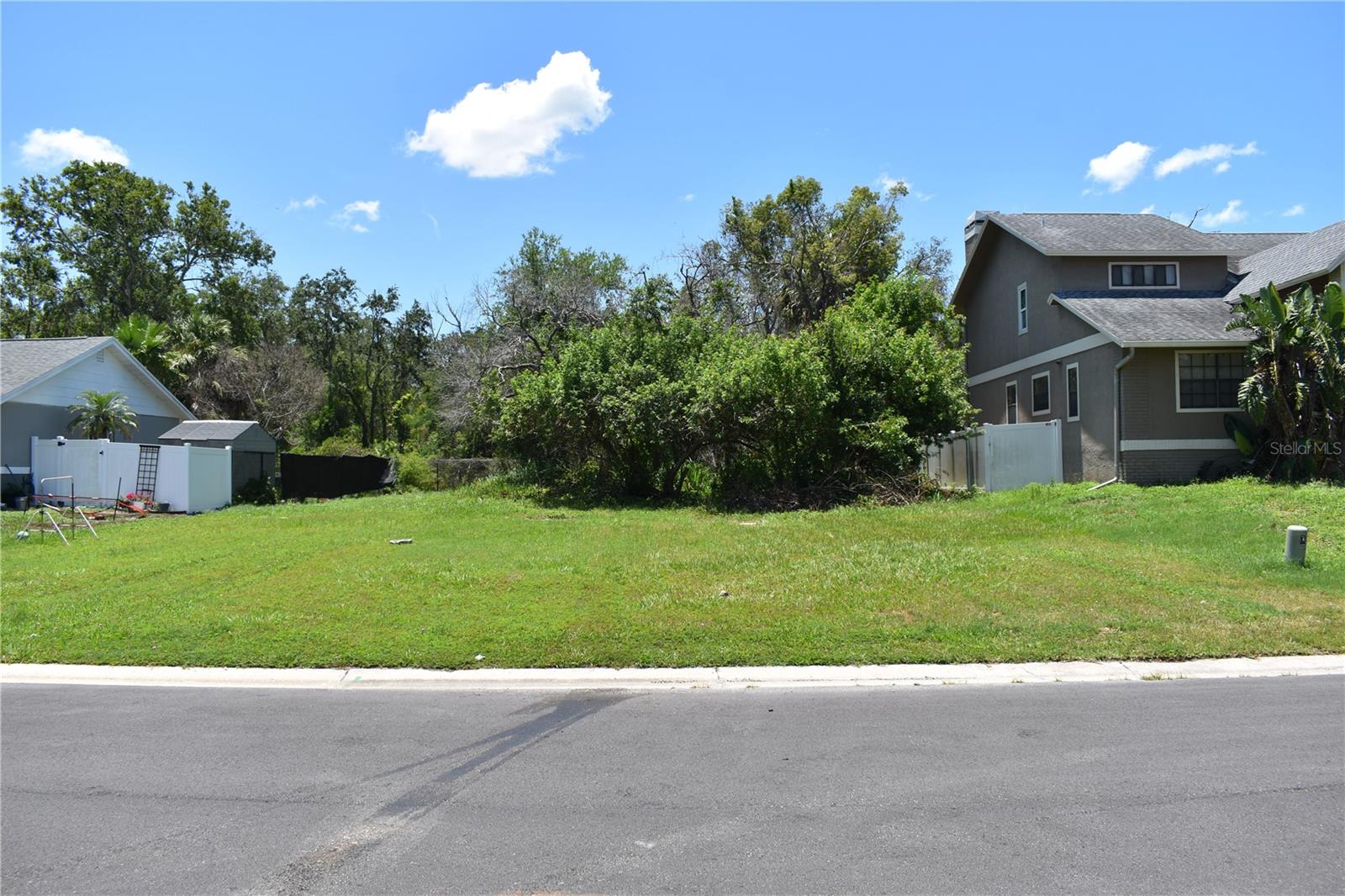 Under contract-accepting backup offers. Design and Build Your Own Boater’s Paradise. This buildable lot is located in Baywood Village in Palm Harbor, Florida. The property is located on a very private cul-de-sac street backed up to vacant wooded county park land. The community is golf cart friendly and has community water access to Klosterman Bayou, Saint Joseph Sound, and beyond into the Gulf of America. The private community boat ramp and dock will give you a short boat ride out to the famous Anclote Key and Three Rooker Island. Enjoy kayaking, paddle boarding, and fishing. Enjoy the local nightlife, festivals, and restaurants of Palm Harbor, Tarpon Springs, Dunedin, which are all just minutes away. Tampa International Airport provides a gateway to the world and is only 22 miles away or 37-minute drive as well as Raymond James Stadium, home to the Tampa Bay Buccaneers; downtown Tampa is only a few minutes further and is home to the Tampa Bay Lightning and the Straz Center for Performing Arts. All this is within only a short drive from your future gulf coastal home.