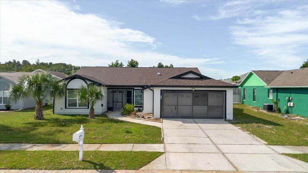 Photo of 8450 Royal Hart Drive, New Port Richey, FL 34653 (MLS # O6346560)