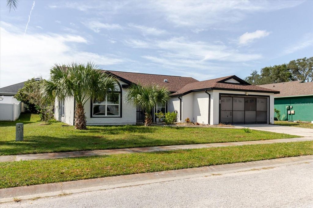 Photo of 8450 Royal Hart Drive, New Port Richey, FL 34653 (MLS # O6346560)