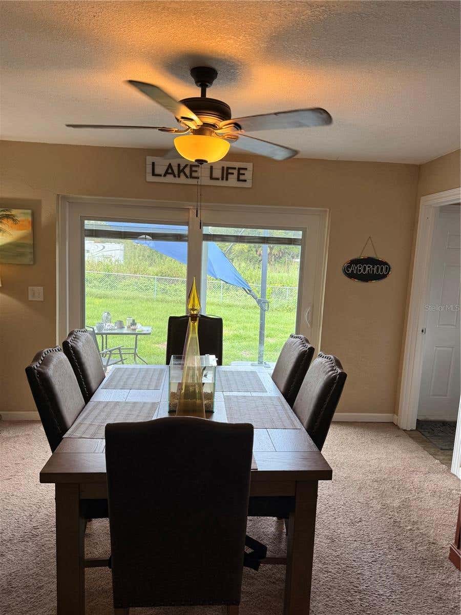 Photo of 113 White Avenue NE, Lake Placid, FL 33852 (MLS # A4701522)