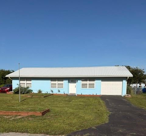 Photo of 113 White Avenue NE, Lake Placid, FL 33852 (MLS # A4701522)