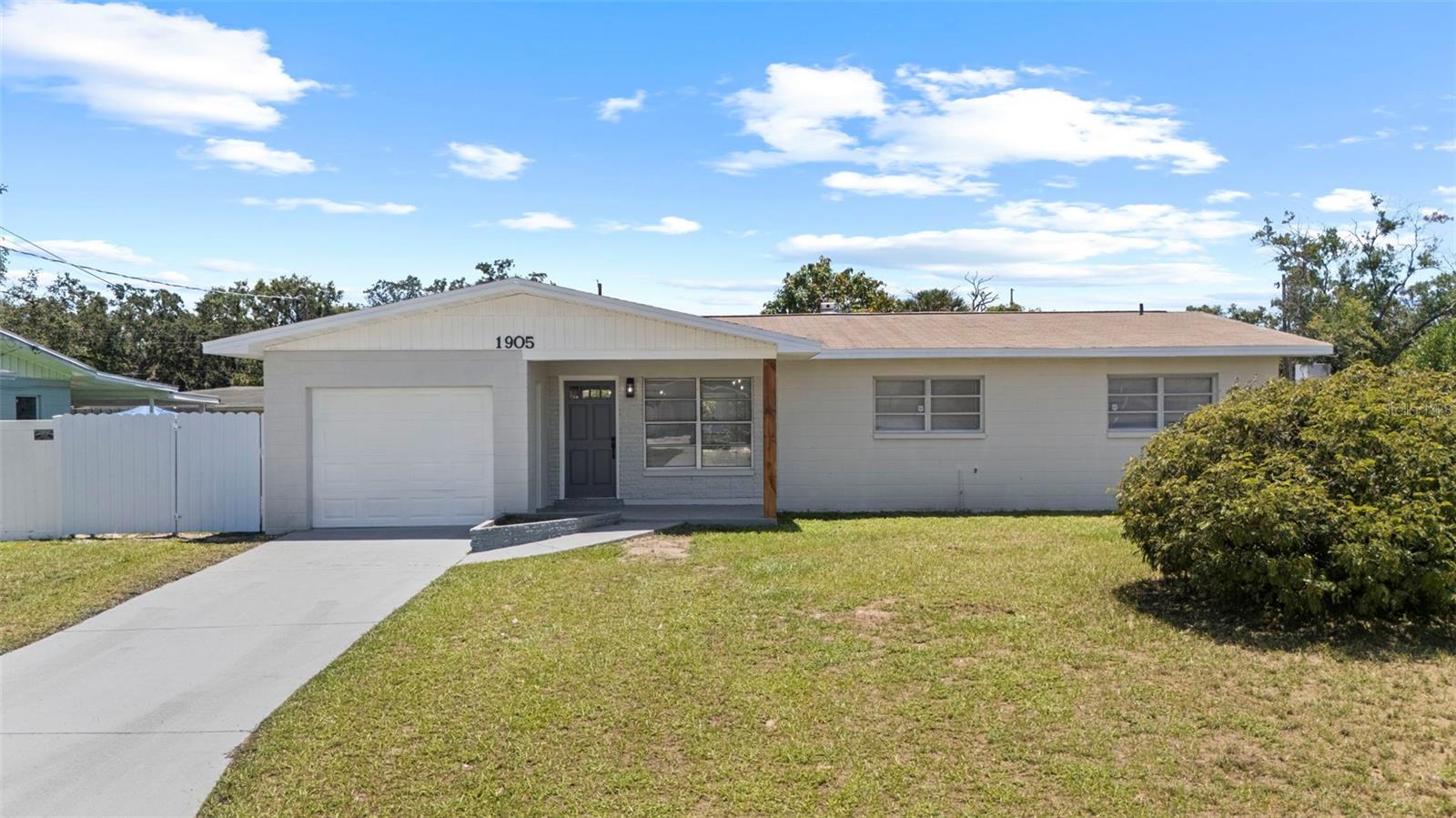 Introducing 1905 Meridel Ave, Tampa, FL 33612 – a remodeled, move-in ready home that blends modern style with comfort and functionality in the Heart of Tampa. This beautifully updated 3-bedroom, 2-bathroom residence sits on a generous 7,000+ sq ft lot, offering plenty of space both inside and out. As you step inside, you’re greeted by a bright and inviting open-concept floor plan that effortlessly connects the living, dining, and kitchen areas. Perfect for both entertaining and everyday living, the layout offers a sense of flow and spaciousness. The modern kitchen is a true highlight, featuring sleek shaker-style cabinets, elegant granite countertops, and brand-new stainless steel appliances. Stylish hardware and fixtures add a bold, contemporary flair, while the expansive counter space provides room for meal prep and casual dining. The home includes two beautifully updated bathrooms designed with porcelain tile finishes and modern vanities, giving a spa-like feel. The large master suite offers ample room for a king-sized bed, a sitting area, or even a home office corner—ideal for relaxation or working from home. Additional updates include a 2017 roof and HVAC system, offering long-term peace of mind. The one-car garage includes an indoor laundry area for added convenience, and the extended driveway provides plenty of additional parking space for guests or multiple vehicles. Outside, the oversized lot offers a great opportunity to create your dream outdoor oasis—whether you envision a garden, a play area, or future additions like a deck or pool. Located in a convenient area of Tampa, you’ll be just minutes from major highways, shopping, dining, and entertainment. With modern updates, functional design, and plenty of space to grow, 1905 Meridel Ave is the perfect place to call home. Don’t miss your chance to see it—schedule your private showing today!
