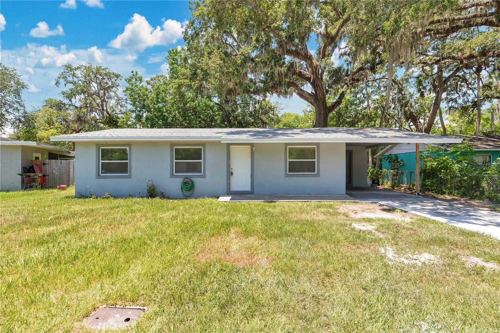 This 3 bed, 1.5 bath split-plan home has been completely updated with quality finishes throughout. Property remained high and dry during the last hurricane. Enjoy a BRAND- NEW KITCHEN with STAINLESS STEAL APPLIANCES, GRANITE COUNTER TOPS, and WHITE SHAKER CABINETS. Major updates include a NEW ROOF 2021, A/C, ELECTRICAL PANEL, PLUMBING, WATER HEATER, and BATHROOMS. FRESH PAINT, NEW LAMINATE FLOORING, a NEWLY POURED CONCRETE DRIVEWAY, SCREENED PATIO, and NEW SOD make this home move-in ready. Conveniently located near major roads, top colleges, and just minutes from the beach—schedule your tour today! Seller offers closing cost assistance to buyers who use a preferred lender offering up to 1% of the loan amount for a one year rate buydown or closing credits for this home when financed!