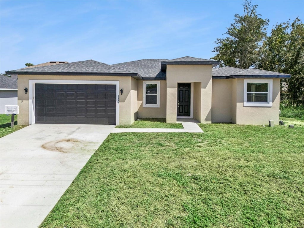 Photo of 1444 Sarasota Drive, Poinciana, FL 34759 (MLS # O6444635)