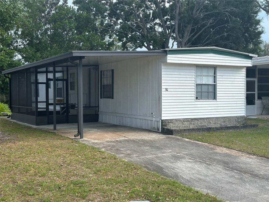 Under contract-accepting backup offers. Welcome to 30 Elda Lane -- a very well-kept 3 bed 2 bath mobile home where you own the land... No lot rent, just freedom and value... This property has been lovingly maintained and offers a comfortable, move-in ready space perfect for full-time living or a seasonal getaway... A few upgrades that fit your style can wait... Enjoy the charm of a quiet neighborhood while being just minutes from shopping, dining, and the beautiful Florida beaches. Opportunities like this don't come around often--ownership, location, and affordability all in one! What an amazing Starter home or Rental...!