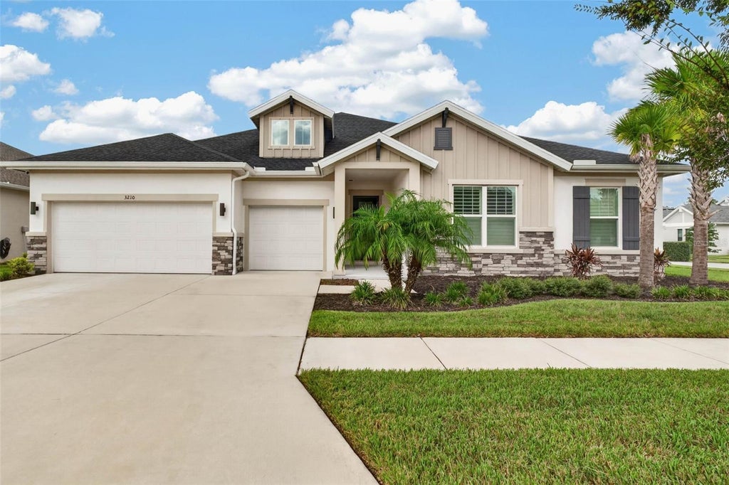 Photo of 3210 Tour Trace, Land O Lakes, FL 34638 (MLS # TB8552913)