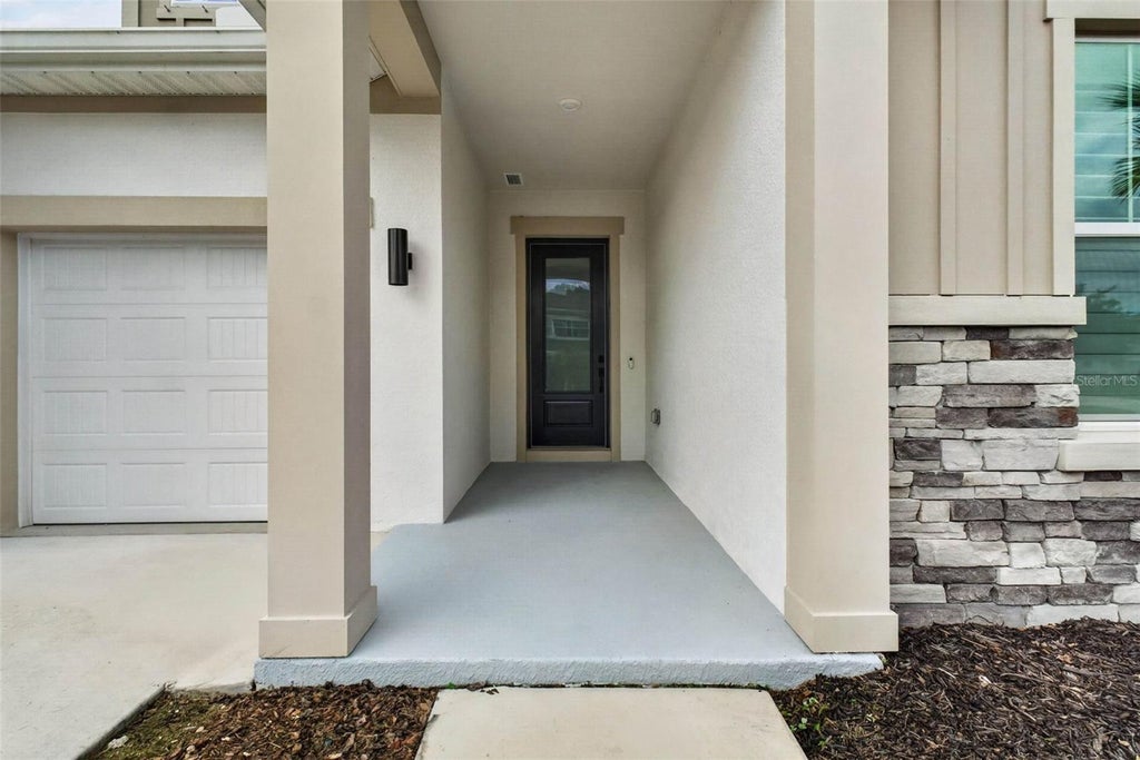 Photo of 3210 Tour Trace, Land O Lakes, FL 34638 (MLS # TB8552913)