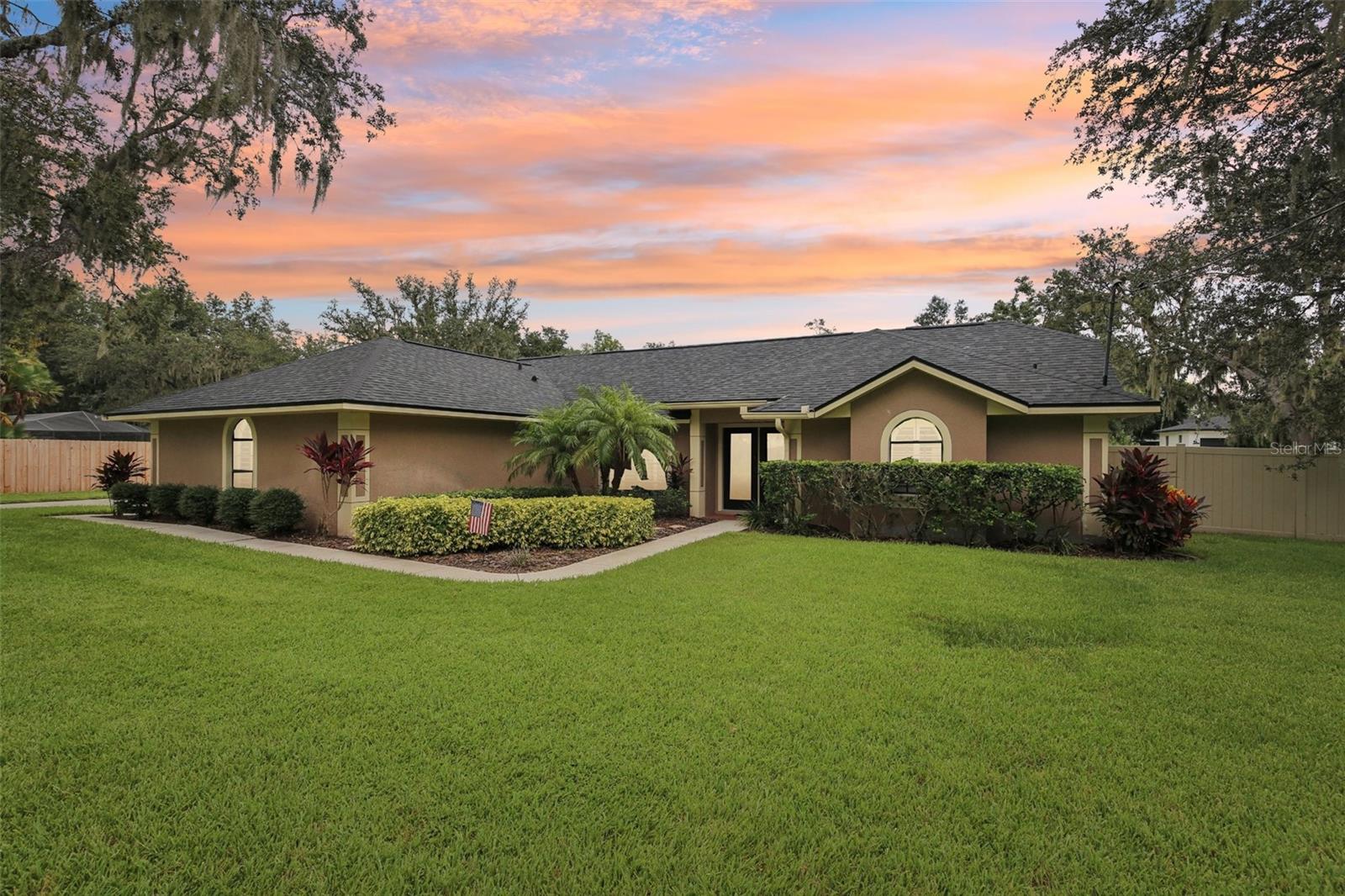 Welcome to this fully upgraded retreat that blends open-concept living, privacy, and premium features — all on nearly an acre in one of Riverview’s most desirable locations.
This custom home offers a rare combination of function and personality, with thoughtful finishes, expansive spaces, and room to grow. The chef’s kitchen boasts granite countertops, stainless steel appliances, and a breakfast bar, flowing seamlessly into the dining area and living room with a cozy wood-burning fireplace. The primary suite features a gorgeous, fully remodeled bathroom, and every inch of the home reflects intentional design.
Step outside to enjoy the sparkling pool, oversized lot with manicured landscaping, and a screened-in patio perfect for relaxing or entertaining. Bring all your toys — there’s even an oversized open barn for covered boat storage, RV parking, and more.
This property is move-in ready, modernized, and perfectly located — giving you the space, freedom, and flexibility to live the lifestyle you’ve always wanted.