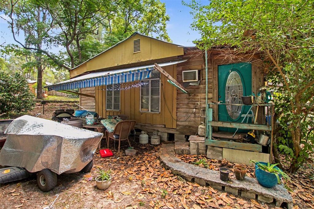 Photo of 8955 S Lakeshore Drive, Floral City, FL 34436 (MLS # TB8500840)