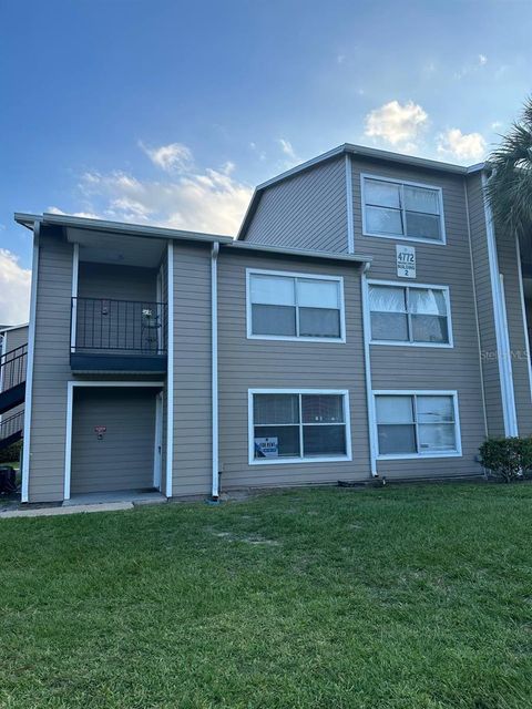 Photo of 4772 Walden Circle #11, Orlando, FL 32811 (MLS # O6361965)